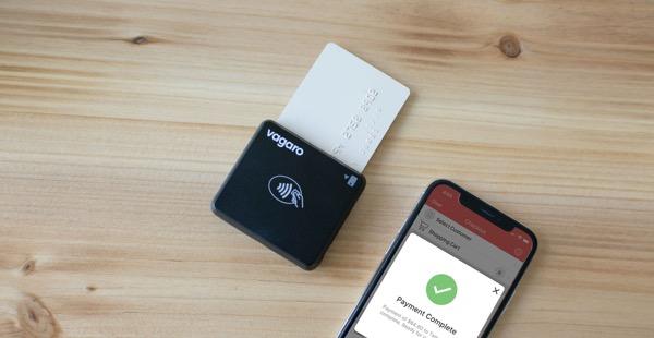 A picture of an iPhone syncing Vagaro software to our VMS card reader