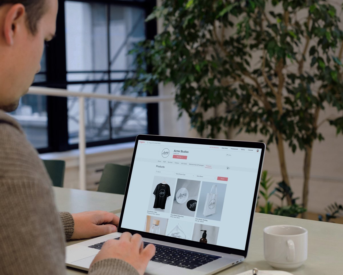 Barbershop owner viewing the products on his business page in the Vagaro online store.