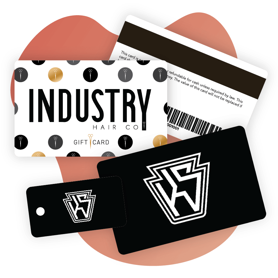An image of branded gift cards and membership cards that can be made within Vagaro's salon, spa and fitness software.